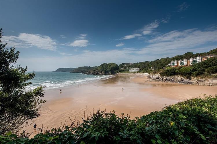 Explore the quiet, historical and sunny beach of Gower, Swansea